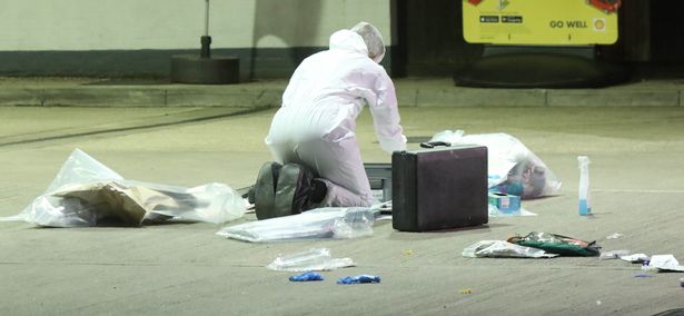 Forensic investigators comb the scene in Epping